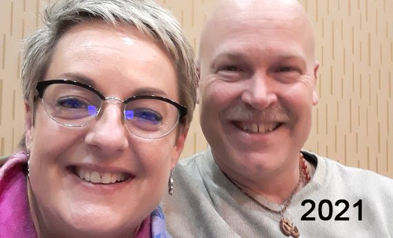 This picture shows Frank and Julie at a wellness event after they regained their health and wellness again.  They are smiling and appear to be healthy.